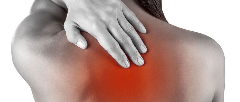 Back pain in the shoulder blade area.